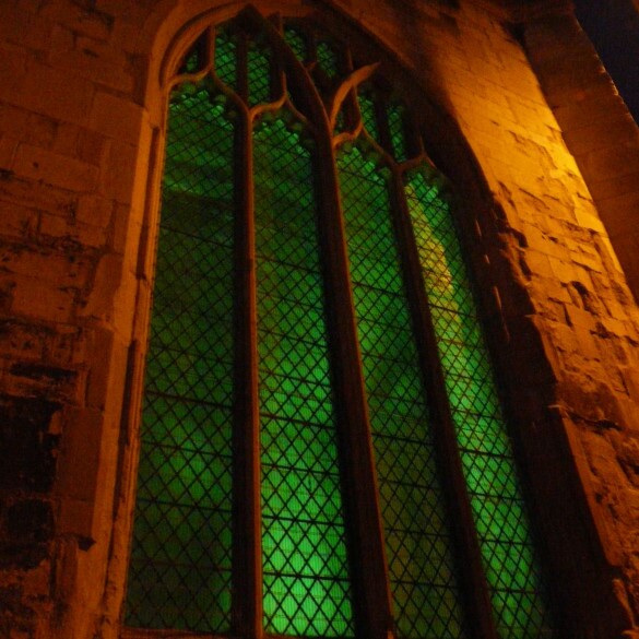 exterior spotlights lighting up a church