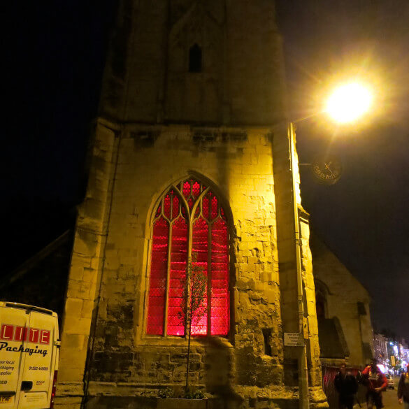 exterior spotlights lighting up a church
