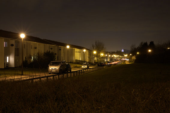 row of street lights on a housing estate