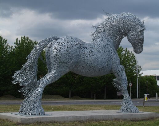 sculpture of a galloping horse
