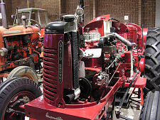 tractors being lit by spotlights