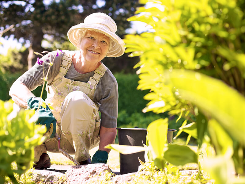 older lady enjoying gardening